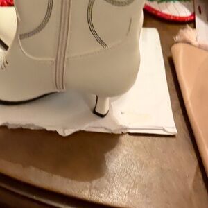 Stylish White Boots with Black Stitching